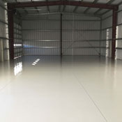 solid white aircraft hangar epoxy floor coating for commercial aviation facility in Charlotte NC