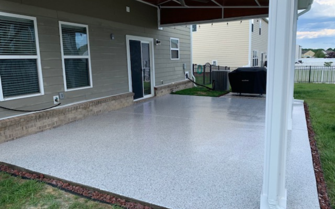 Covered Backyard Porch Epoxy Floor Installation With Shoreline Gray Flake