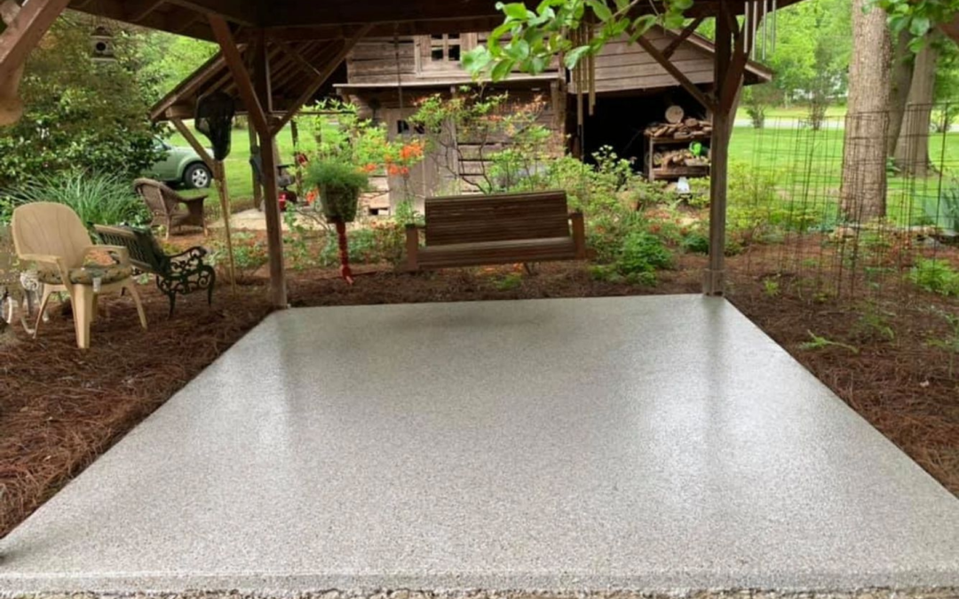 Covered Concrete Deck Epoxy Floor Installation With Light Stone Flake Finish