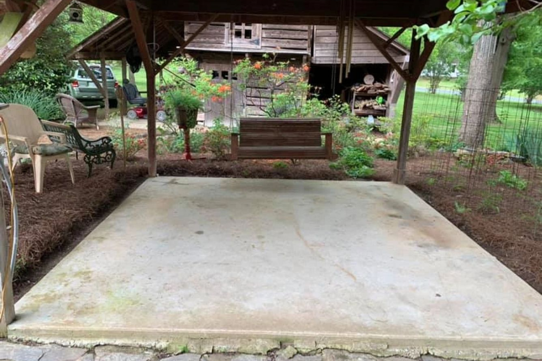 bare concrete garage floor before epoxy installation and surface prep