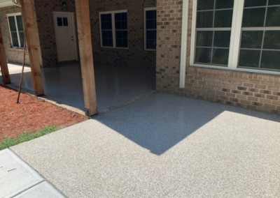 Covered Brick Patio Epoxy Floor Installation With Sandstone Flake